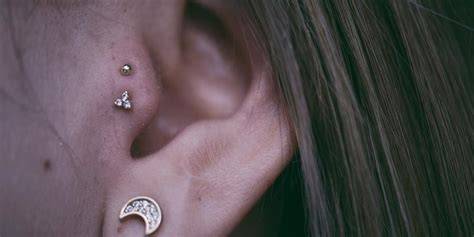 double tragus piercing trend popsugar beauty