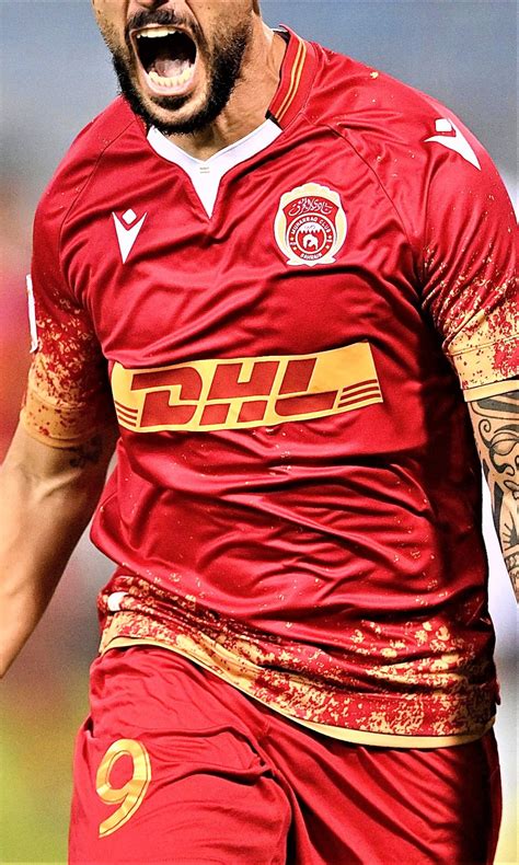 muharraq club   home kit