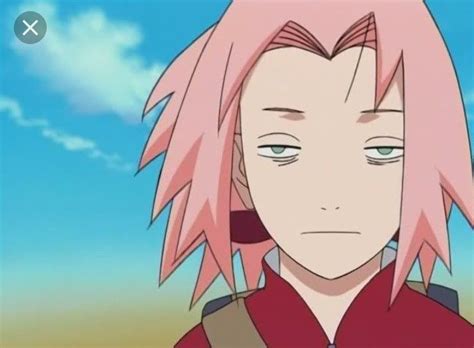an anime character with pink hair looking at the camera and staring ...