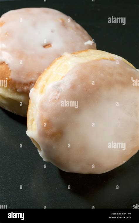 Jam Donuts / iced buns Stock Photo - Alamy