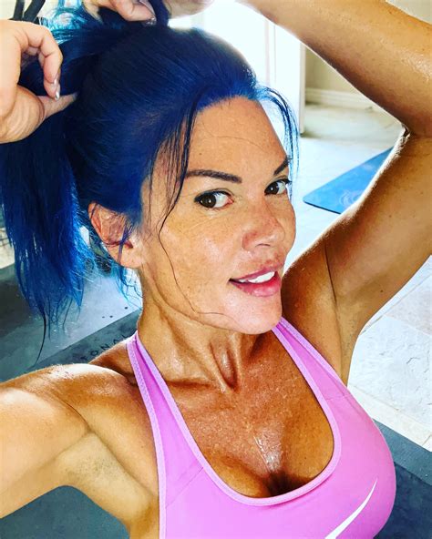 Sweaty, busty, blue-haired, fit MILF. Kink-friendly with explicit