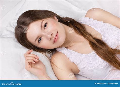 Young woman in a beg stock photo. Image of indoors, morning - 28549668