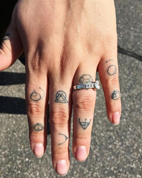 Finger Tattoo Symbols