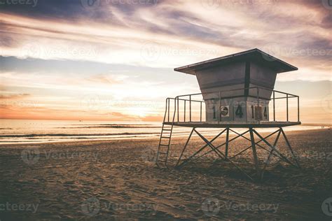 Lifeguard Tower at sunset near Ocean 26283937 Stock Photo at Vecteezy