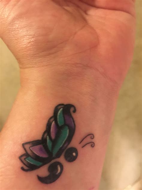 domestic violence survivor tattoo 11