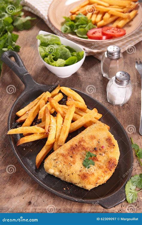Breaded Meat and French Fries Stock Image - Image of casserole, french ...