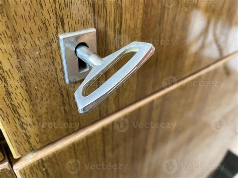 Iron metal chrome key for opening and closing the lock in the keyhole