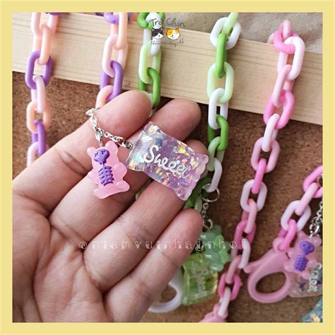 charm keo  trong nhua lap lanh lam mat day chuyen moc khoa