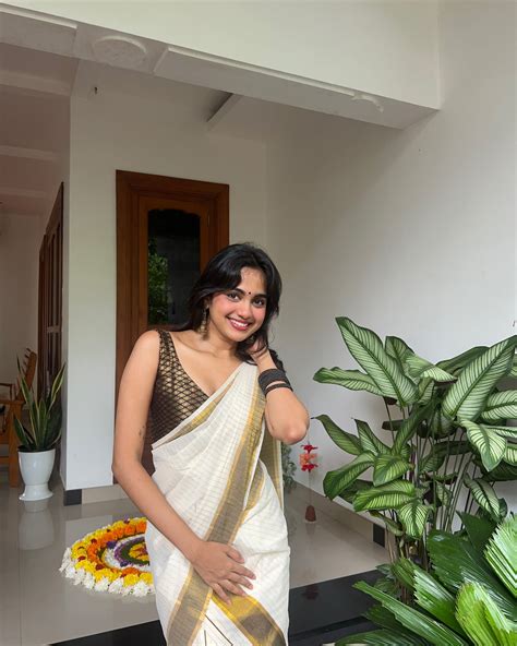 devika sanjay | sharkara upperi time happy onam 🌾 | Instagram