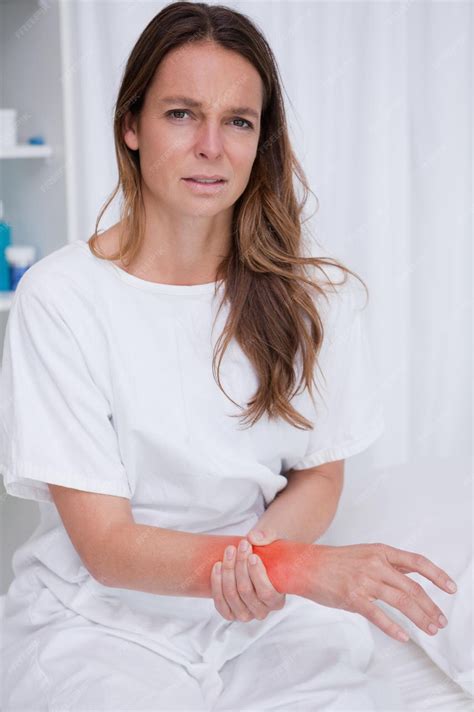 Premium Photo | Woman in the hospital feeling her pulse