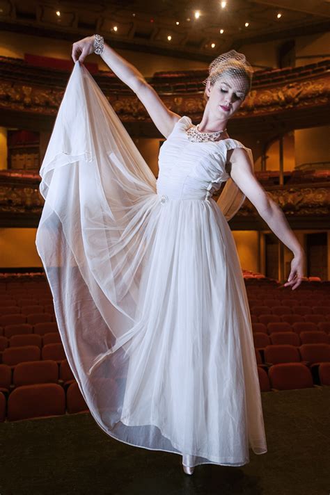 Stunning ethereal vintage wedding gown with layers of flowing chiffon
