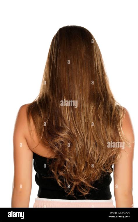 Back view of a woman with long wavy hair on a white background Stock ...