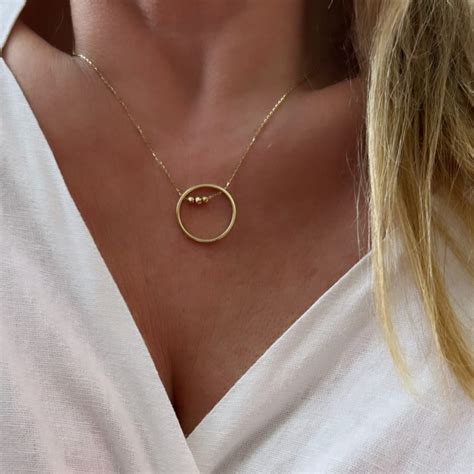 Złoty naszyjnik ankier z motywem okręgu z kulkami próby 585 – Król