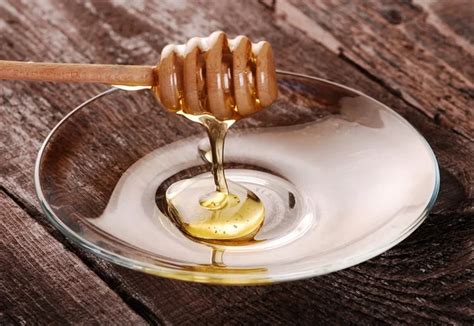 Golden honey — Stock Photo © Kaminska #11438045