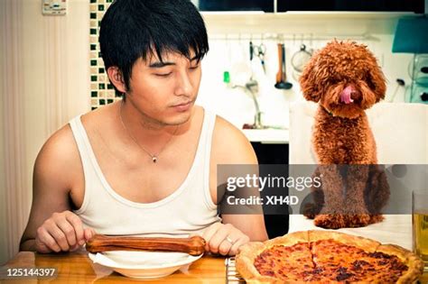 Hungry High-Res Stock Photo - Getty Images