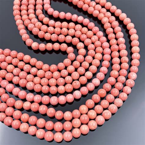 Коралл розовый. Бусины 9 мм. Нить 38 см