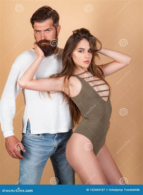Hot Woman Moaning in Ecstasy Embracing Man. Kissing Couple Portrait