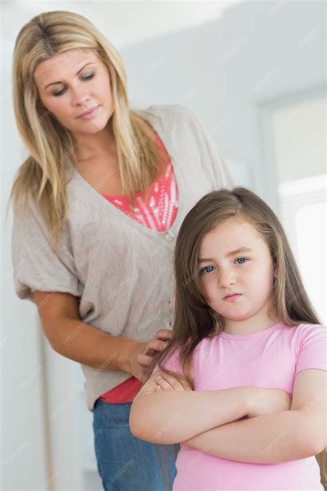 premium photo mother   comfort angry daughter
