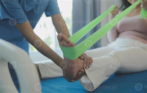 Patient doing some special exercises under supervision in a room