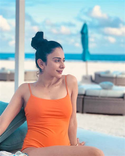 Pic Talk: Rakul In Orange Monikini, #ThankGod For Holiday