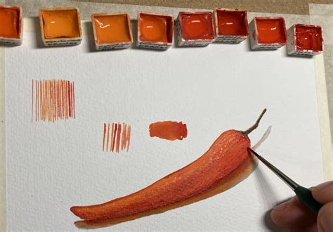 Blending oranges and reds with a rigger brush - DANIEL SMITH Artists’ Materials