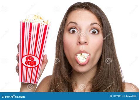 Girl Eating Popcorn stock image. Image of background - 17775911