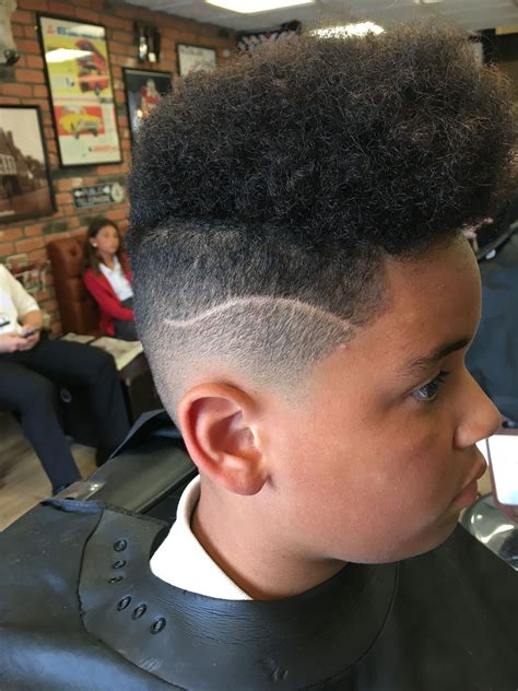 Afro Hair clipper fade done by Alex at Alexanders barbershop in
