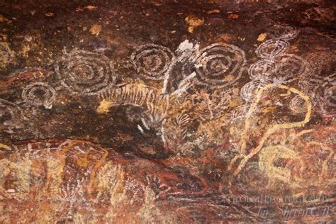 visiting uluru    time rock art cave paintings