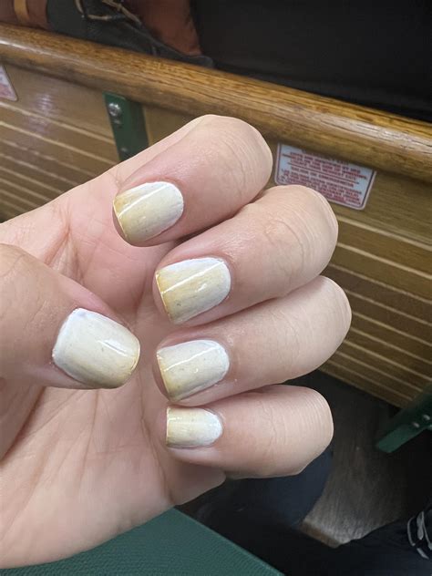 Painted my nails white last night and woke up to them turning yellow