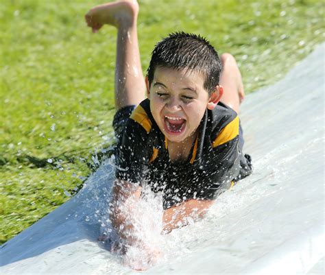 Summer slip-sliding away in Sugar House - Deseret News