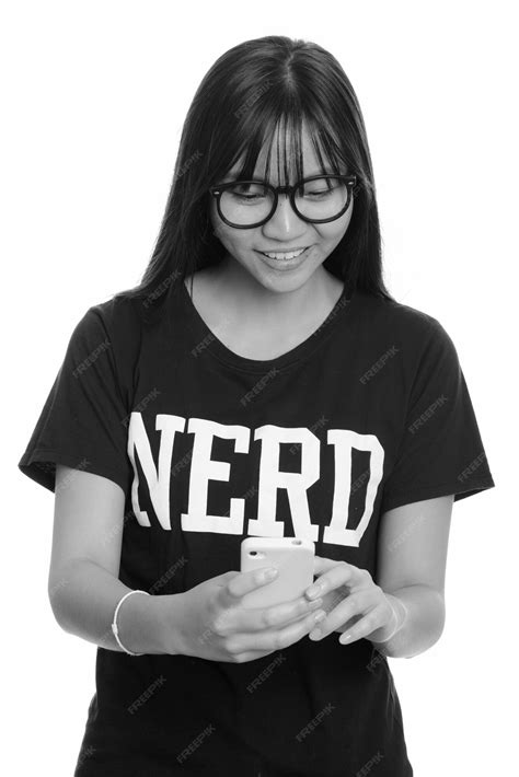 Premium Photo | Young nerdy asian teenage girl with eyeglasses isolated