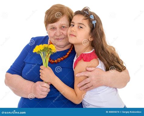 Бабушка с ее внучкой стоковое фото. изображение насчитывающей ...