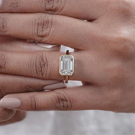 bezel emerald cut engagement rings 9