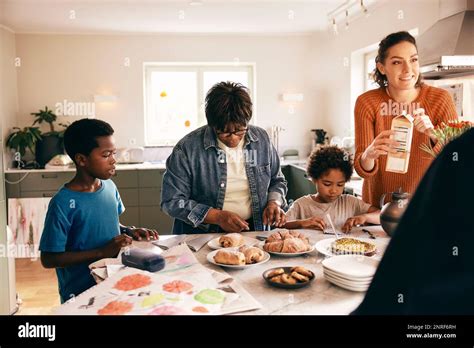 Children helping each other hi-res stock photography and images - Alamy
