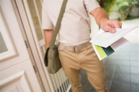 Premium Photo | Postman delivering a letter