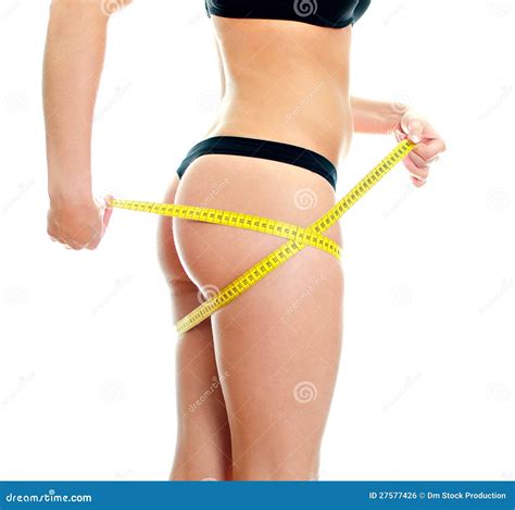 Slim Female Body with Measure Tape Around Hips. Stock Photo - Image of