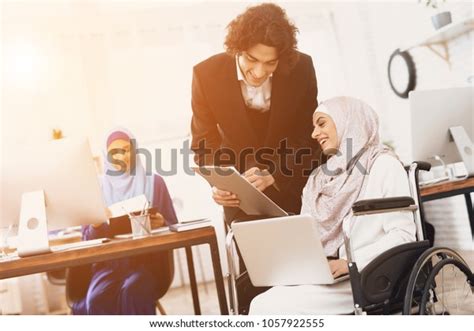 Disabled Arab Woman Hijab Wheelchair Working Stock Photo 1057922555 ...