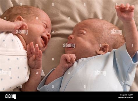 Babies crying, premature identical twin boys Stock Photo - Alamy