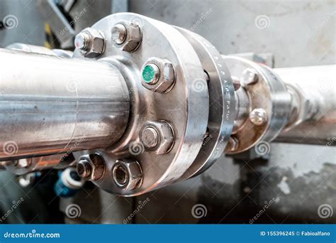 close  view   flange  bolts   heavy metal joint   pipe