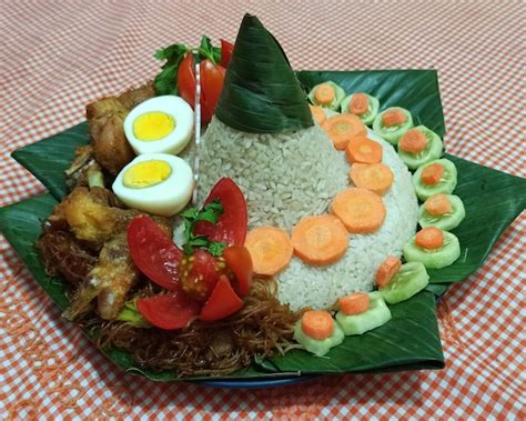 premium photo nasi tumpeng  traditional indonesian food