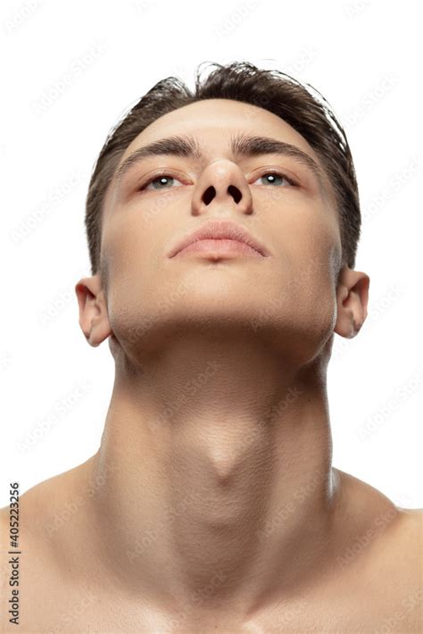 muscular neck portrait  young man isolated  white studio