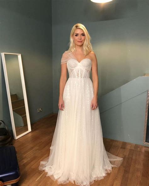 Holly Willoughby stuns fans with rare wedding dress photo | HELLO!