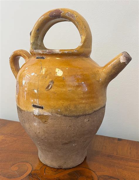 Late 19th Century French Provincial Yellow Glaze Terra Cotta Wine Jug
