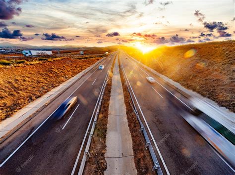 premium photo trucks  cars driving  highwayinternational