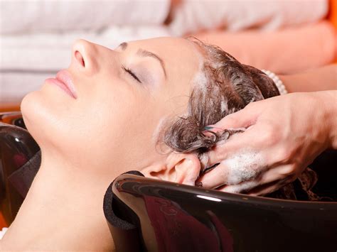 Woman sues hair salon over claims 'huge stroke' was caused by head ...