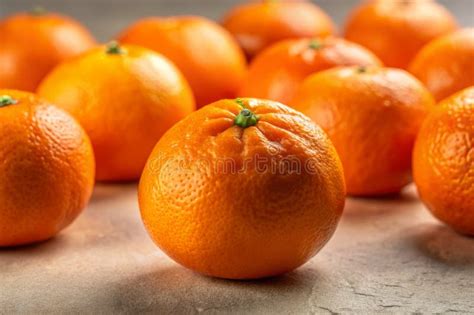 closeup view  fresh oranges vibrant citrus fruits   neutral