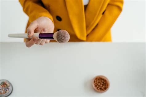 Yellow Mascara on Yellow Background · Free Stock Photo