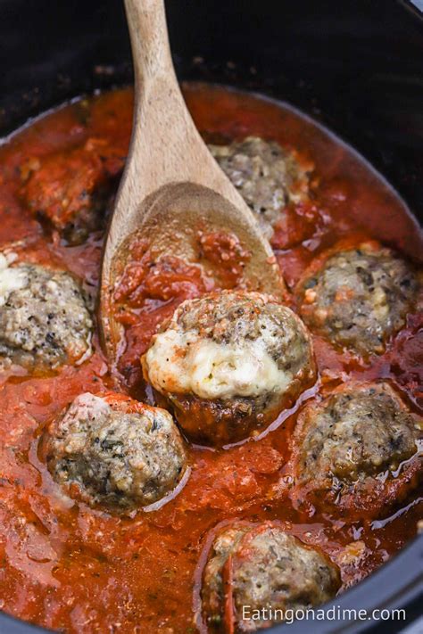 Crockpot Mozzarella Stuffed Meatballs - Eating on a Dime