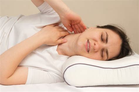 A Woman Has a Sore Neck after Sleeping on the Wrong Uncomfortable ...