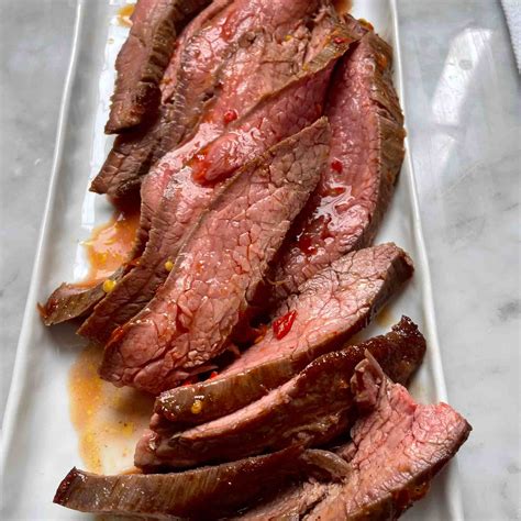 cut flank steak against the grain 4